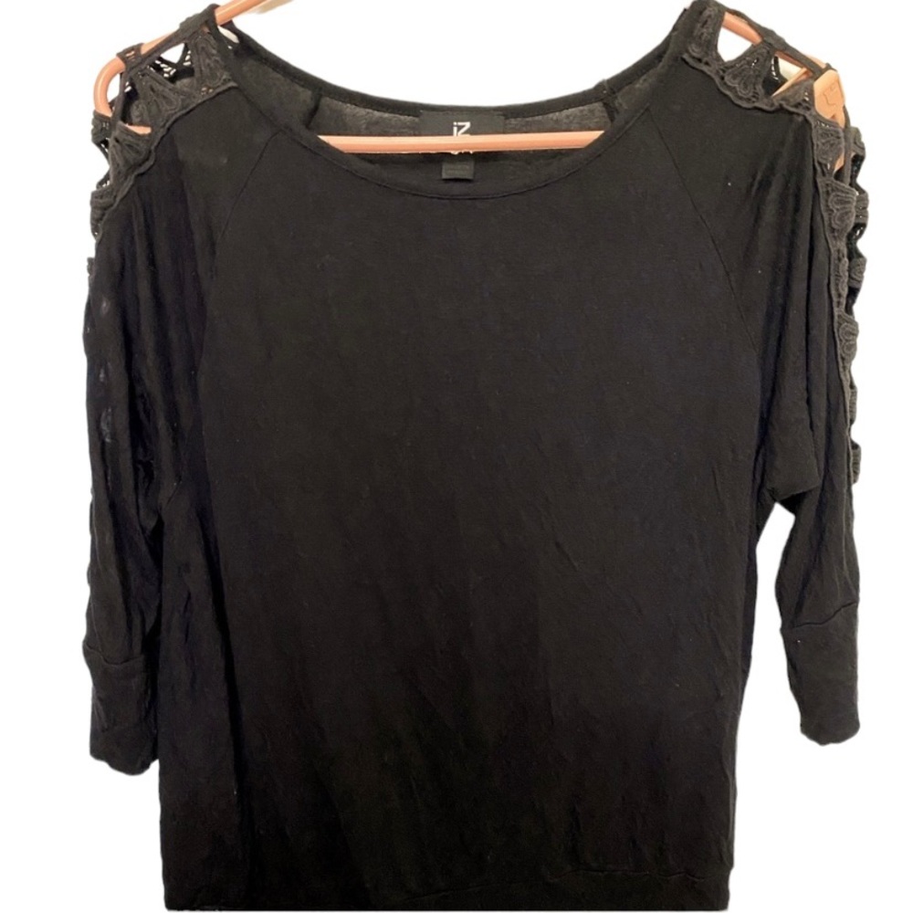 Black shirt with open design on sleeves